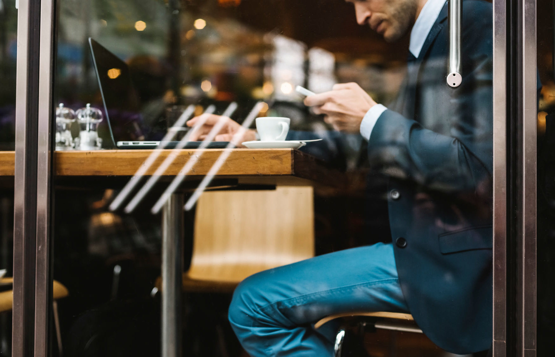 Businessman Working Sitting At Cafe Masterclass Social Selling for Financial Advisors